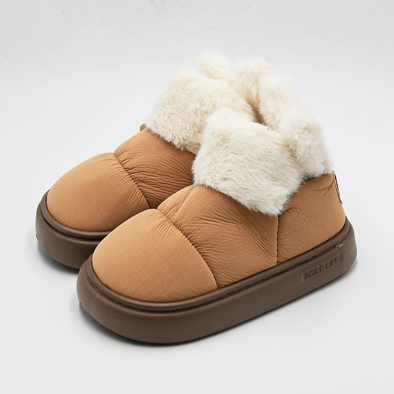 Botas de neve no meio do topo vertical